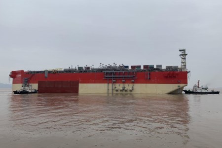 Karish project FPSO hull being towed to Singapore